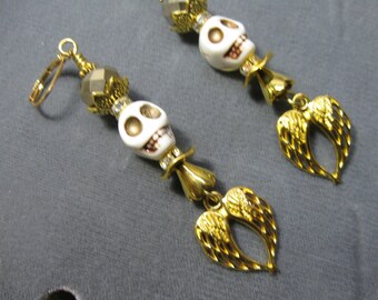 Day of the Dead/Dia de los Muertos Howlite Bone Skull Earrings with Gold Tone Angel Wings and Gold tone Faceted Bead