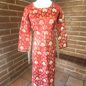 red edwardian house dress A good skirt doesn't just fit