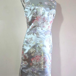 May include: A set of three ceramic mugs with a speckled, matte finish. The mugs are in shades of cream, light gray, and dark gray. Each mug has a simple, minimalist design, perfect for coffee or tea.