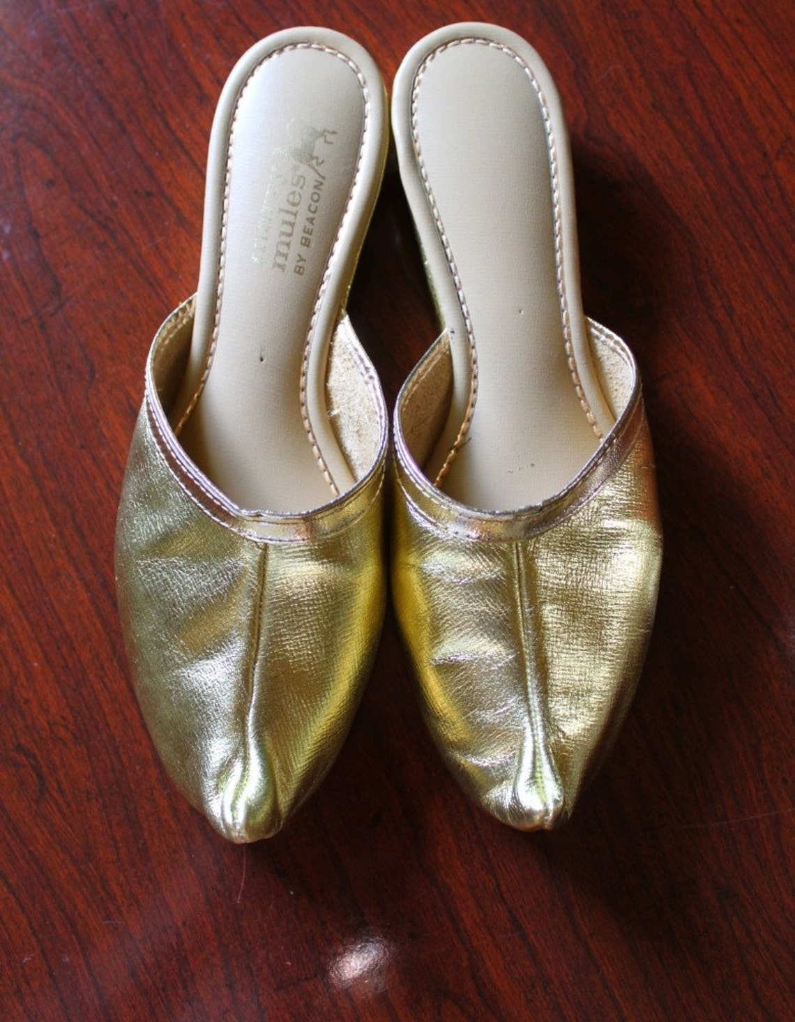 inc gold slippers