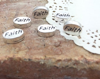 Faith beads - Small Silver beads stamped "Faith" doublesided - 9mm long, 11mm wide, 3mm thick, hole 1mm