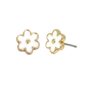 May include: A pair of gold flower stud earrings with white enamel. The flowers have five petals and a small gold center.