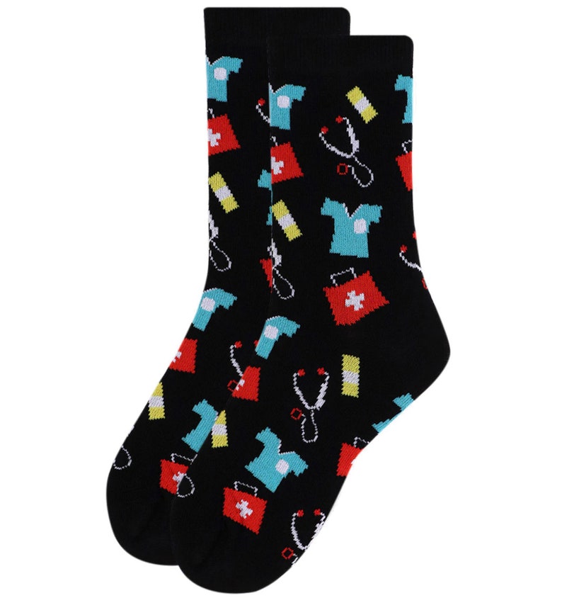 May include: A pair of black socks with a colorful pattern of medical symbols, including a stethoscope, first aid kit, and a doctor's uniform.
