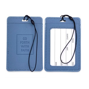 May include: Two blue leather ID badge holders with a black lanyard. The holder on the left has the text "Go Forth With Faith" embossed on the front. The holder on the right has a clear plastic window for displaying an ID card.