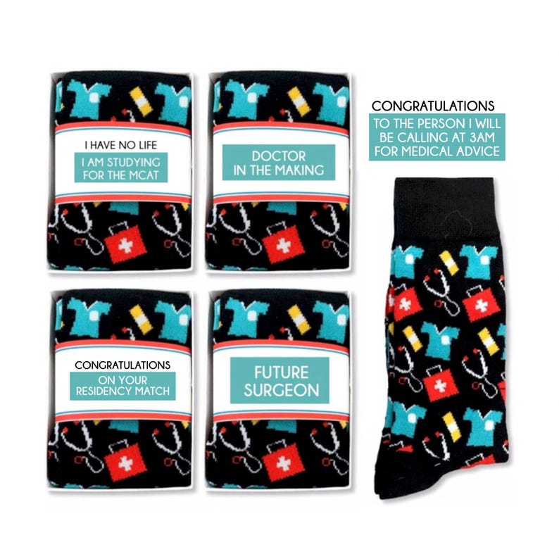 May include: Four black and white gift boxes with colorful socks inside. Each box has a different message on the front. The socks have a pattern of medical symbols, including a stethoscope, a first aid kit, and a doctor's coat. The message on the boxes are: "I have no life I am studying for the MCAT", "Doctor in the making", "Congratulations on your residency match", and "Future Surgeon".