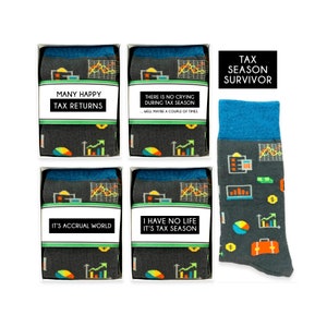 May include: Four boxes of socks with different humorous tax-themed sayings. The socks are gray with a blue cuff and feature a variety of colorful financial graphics. The boxes are white with black text. The socks are packaged in a clear plastic bag with a white tag that says "Tax Season Survivor".