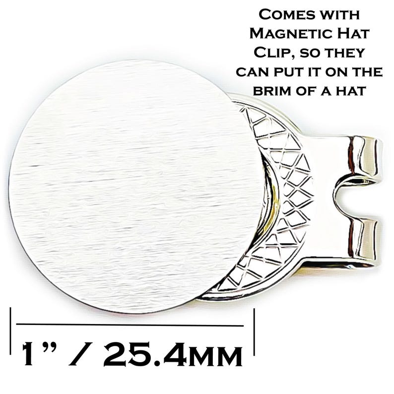 May include: A silver magnetic hat clip with a round, textured face, measuring 1 inch (25.4mm) in diameter. The clip has a unique design and the text "COMES WITH MAGNETIC HAT CLIP, SO THEY CAN PUT IT ON THE BRIM OF A HAT".
