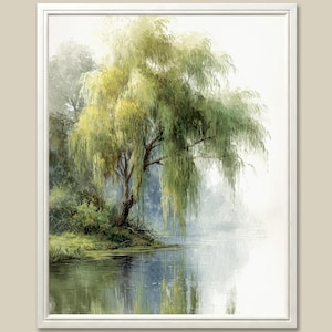 May include: A framed watercolor painting of a weeping willow tree by a calm body of water. The tree's green leaves cascade down towards the water, reflecting in the still surface. The artwork has a soft, ethereal quality, with a white frame.