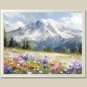 May include: A framed landscape oil painting depicts a snow-capped mountain under a cloudy sky. A vibrant meadow of colorful wildflowers in shades of purple, pink, orange, and yellow fills the foreground, with green trees on the left.