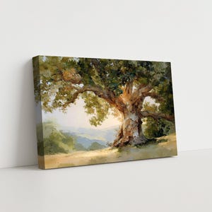 May include: A canvas print of a large oak tree in a field. The tree has a thick, textured trunk and sprawling branches with green leaves. The background features rolling hills and a soft, golden light.