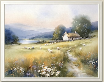 May include: A framed watercolor painting depicts a serene rural landscape. A white cottage with a thatched roof sits on a grassy hill, with sheep grazing nearby. A path leads through the field, and mountains are visible in the distance.