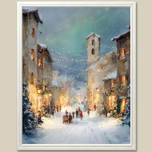 Puede incluir: Pintura al &oacute;leo enmarcada que representa una escena de calle de un pueblo europeo nevado al anochecer. Edificios con luces c&aacute;lidas bordean la calle, con figuras paseando por el camino nevado. Guirnaldas de luces y decoraciones festivas.