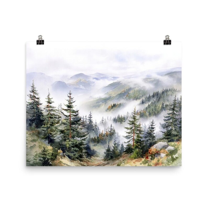 May include: Watercolor painting of a misty mountain landscape. The artwork features evergreen trees in the foreground, with layers of hills and mountains fading into the distance. The color palette includes greens, blues, and whites.