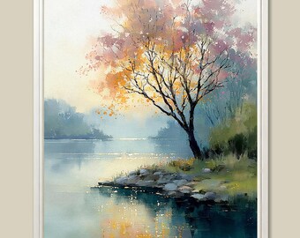 May include: A framed landscape painting depicts a serene waterside scene. A tree with orange and pink foliage stands on the bank, its reflection mirrored in the water. The painting uses soft brushstrokes and a muted color palette of blues, greens, and yellows.
