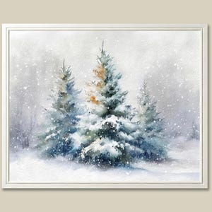 May include: Watercolor painting of a winter scene with three snow-covered evergreen trees. The trees are shades of blue and green, with touches of orange. Snowflakes fall in the air, creating a serene, wintry landscape. The artwork is framed in a white border.