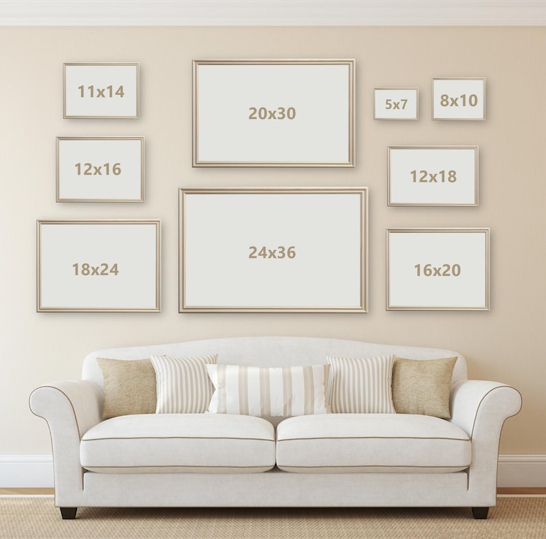 May include: A collection of framed art prints in various sizes, including 11x14, 20x30, 5x7, 8x10, 12x16, 12x18, 18x24, 16x20, and 24x36 inches, displayed above a white sofa with decorative pillows. The frames have a metallic finish.