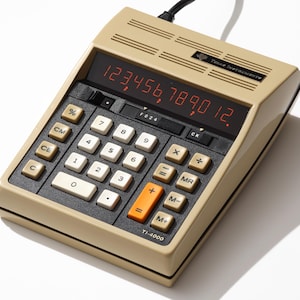 May include: A vintage beige Texas Instruments TI-4000 calculator with a black keypad and red LED display showing the number 123,456,789,012. Features include number keys, function keys, and a plus/minus key. A black power cord is attached.
