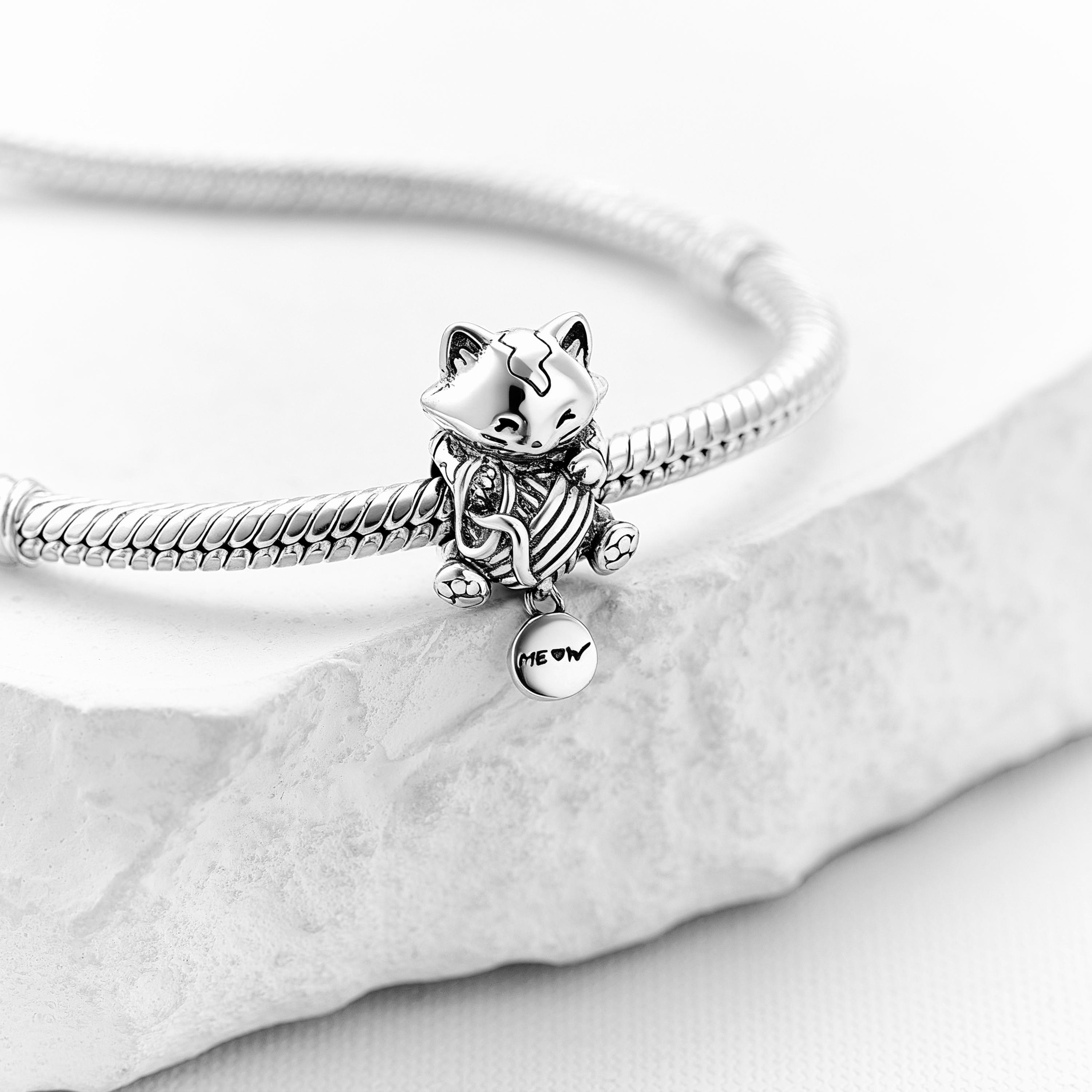 Charm pendente con topazi e argento gattino