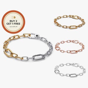 May include: A selection of chain link bracelets in gold, rose gold, and silver. One bracelet combines gold and silver links. The bracelets feature various clasp styles. A circular graphic with text reading "BUY 2 GET 1 FREE Up to 50% off" is in the upper left corner.