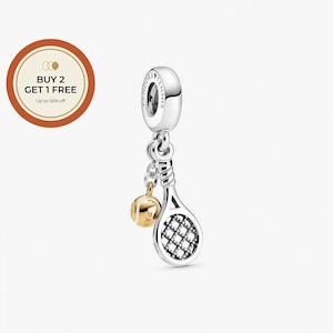 May include: A silver tennis charm with a tennis racket and ball. The racket has a black and white checkered design, and the tennis ball is gold. The charm is suspended from a silver loop with the word "TENNIS" on it.