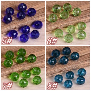 May include: Assortment of faceted glass beads in four colors: blue, green, light green, and teal. The beads are arranged in four groups of eight beads each, labeled 5#, 6#, 7#, and 8#.