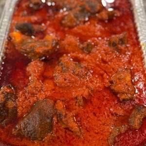 fried goat meat stew (half pan)