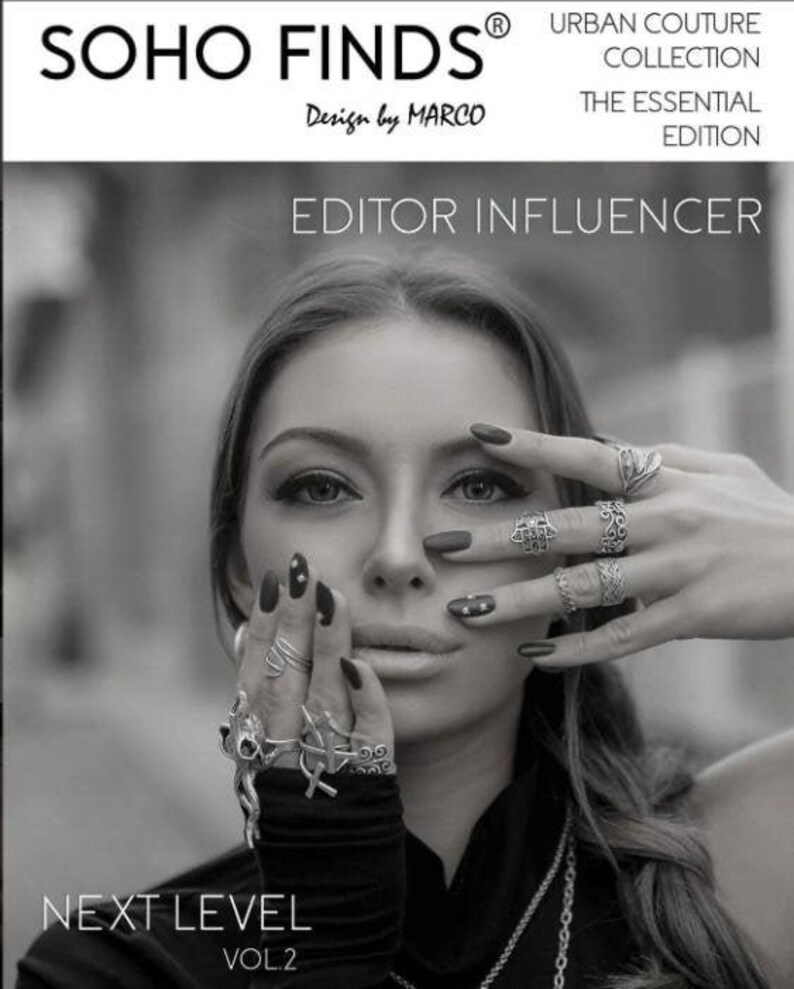 The image is a black and white photo of a woman with long hair wearing multiple rings on her fingers. She is holding her hand up to her face, obscuring her face. The image appears to be a collage of multiple images, and the text includes "SOHO FINDS", "URBAN COUTURE COLLECTION", "THE ESSENTIAL EDITION", "EDITOR INFLUENCER", "NEXT LEVEL", and "VOL2".