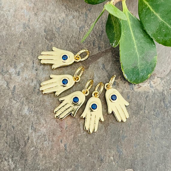 Steal Fatima hands with evil eye beads. - 2013