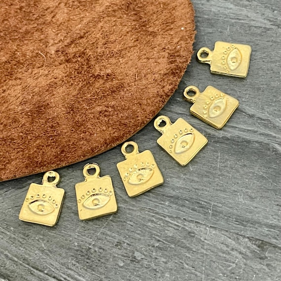 Square Eye Charms: Matte Gold Plated Brass Earrings (6 Pieces). 1009