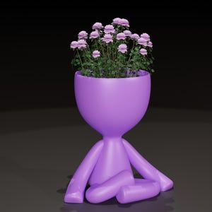 May include: A lavender-colored, stylized planter in the shape of a seated figure. The head of the figure is a bowl filled with pink roses and green foliage. The figure's arms and legs are outstretched, and it is sitting on a dark surface.
