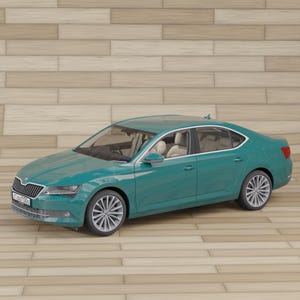 May include: Teal sedan with silver wheels and a light interior. The car is parked on a wooden floor. The car has a license plate on the front.