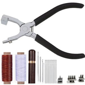 May include: Leather craft tool kit with a black handled plier, two spools of thread, a wooden needle case, and a set of needles.