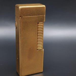 Vintage Dunhill Rollagas Lighter: Gold-Tone Engine-Turned Design, Swiss Made