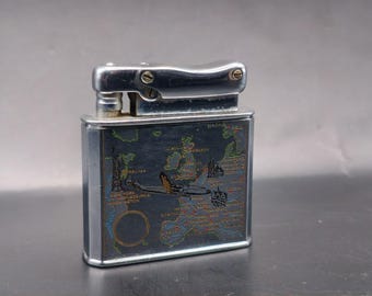 Accendino vintage Ibelo Monopol Germania – Raro design con mappa – Funzionante –