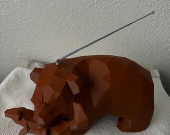 Estatuilla del Sr. Grizz