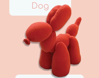 May include: A red plush balloon dog sewing pattern and instructions. The pattern includes instructions for making a plush toy that looks like a balloon animal.