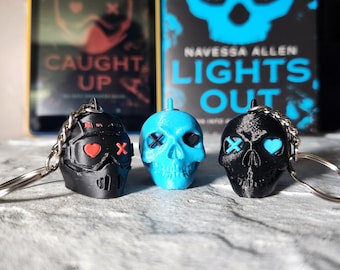 Lights Out Skull | Caught Up Helmet With Heart X Eyes Keychain