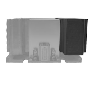 May include: A computer CPU air cooler featuring a metallic silver heatsink with vertical cooling fins, a black fan shroud on the right side, and a central mounting block with a visible serial number label reading MFG P/N CP308771 S/N ARG06600798.