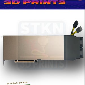 May include: A computer graphics card with a gold and black design. The card has multiple ports and connectors, with the text "STKN 3D PRINTS" at the top and a "Veteran Owned US Business" logo at the bottom.
