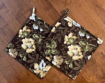 Cream colored flowers on dark brown quilted pot holders set of two quiltsy handmade