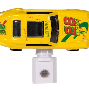 May include: A set of three ceramic vases in varying heights. The vases have a matte finish in shades of cream, beige, and brown. The tallest vase is approximately 10 inches high.