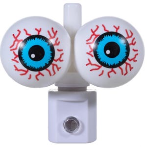 May include: A novelty night light featuring two large, white eyeballs with blue irises, black pupils, and red veins. The night light has a white base and a small, round light. A fun and quirky decorative item.