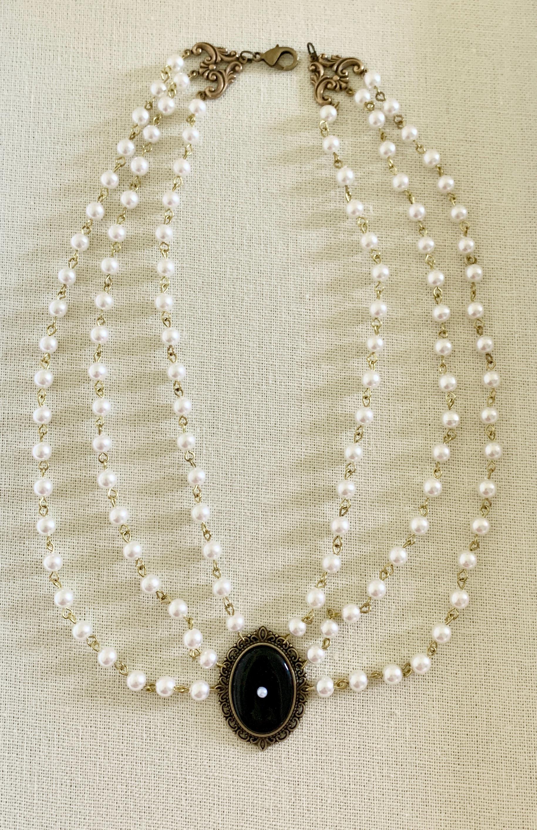 Mary Tudor Black Antique Brass Oval Three Strand White Pearl