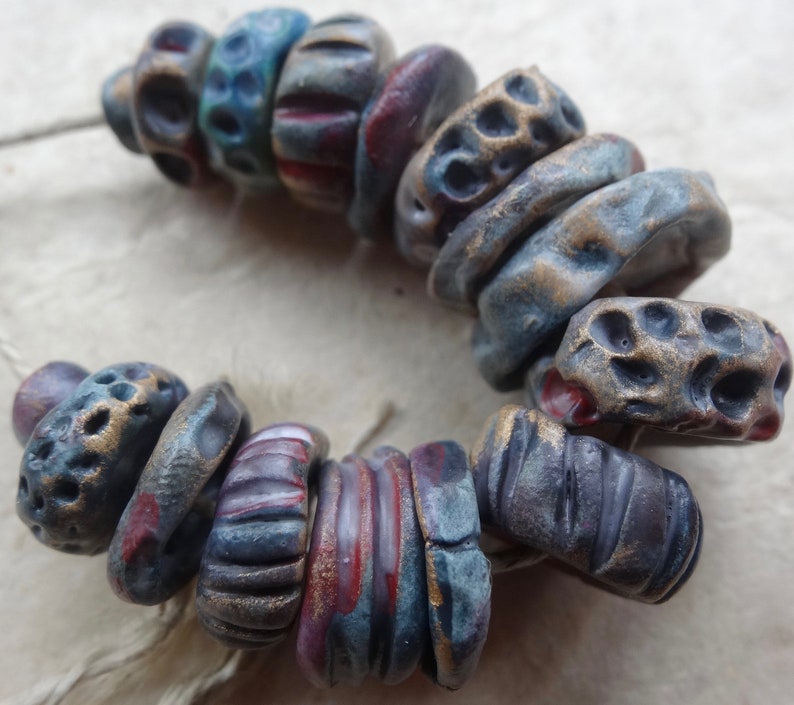 early Summer dusk textured ceramic disc bead set purple red blue red gold katy wroe K44