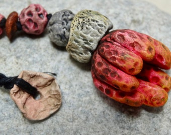 OOAK funky pendant drop forest floor Autumn Fall ceramic flower seed pod bead red pink ochre burnt sienna set katy wroe -D83