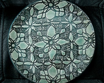 Green-blue, small, ceramic,lace-textured plate