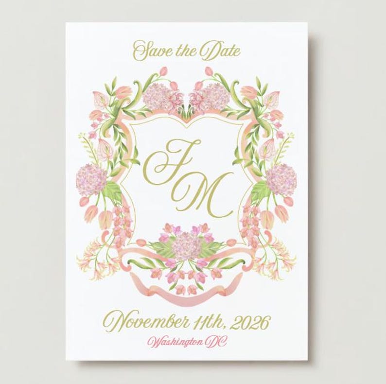 May include: Save the Date card with a pink and green floral design. The card features a gold crest with the initials "F & M" and the date "November 11th, 2026" and the location "Washington DC".