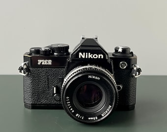 Cámara NIKON FM2 N + objetivo Nikkor 50 mm 1.8 I Cámara réflex japonesa I Cámara de película analógica I Sólida y rápida I Fotografía vintage