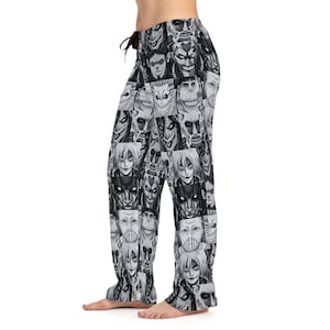 Op de afbeelding: Zwart-witte pyjamabroek met een herhaald patroon van monstergezichten. De broek heeft een taille met trekkoord en een relaxte pasvorm. Het ontwerp bevat een verscheidenheid aan uitdrukkingen en stijlen, wat zorgt voor een spookachtige en unieke uitstraling.