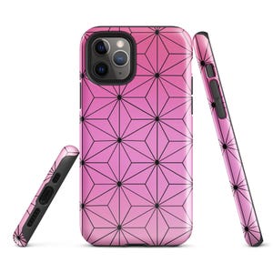 May include: A smartphone case featuring a repeating geometric pattern of black lines forming star-like shapes over a gradient pink background. The design covers the back and sides of the case, which includes cutouts for the camera lens and side buttons.